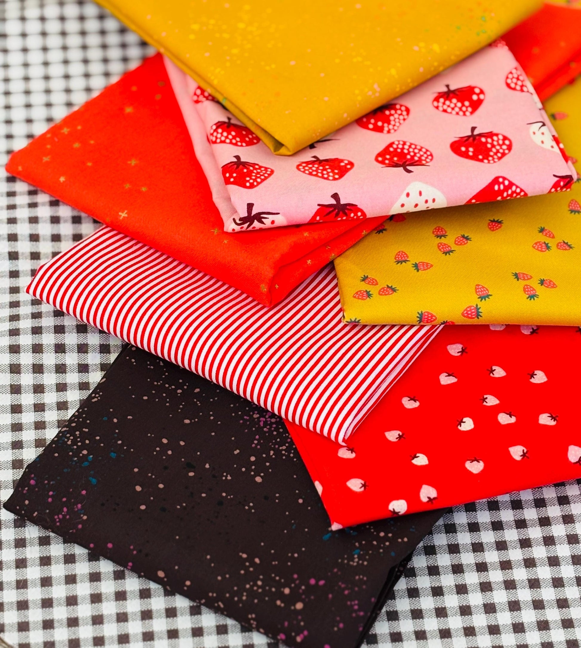 Mini strawberries with a hint of turmeric - 8 fat quarter bundle - gingham - starry - ruby Star - speckled - gold